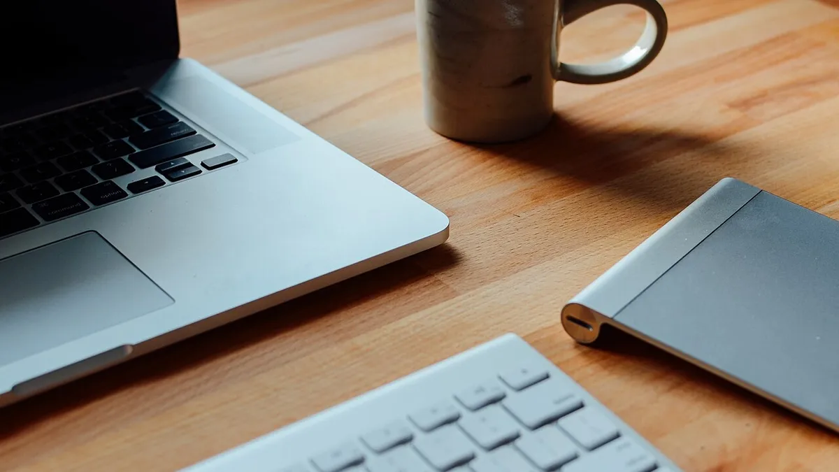 Laptop and a mug (Unsplash)