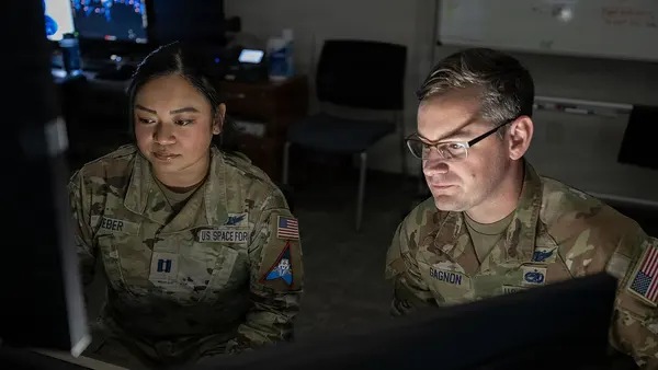 Space Force Guardians assigned to Space Delta 5 monitor a computer workstation (9470306)