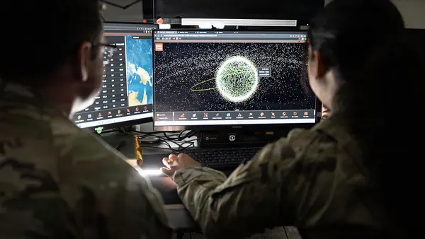 Space Force Guardians assigned to Space Delta 5 monitor a computer workstation (9470308)