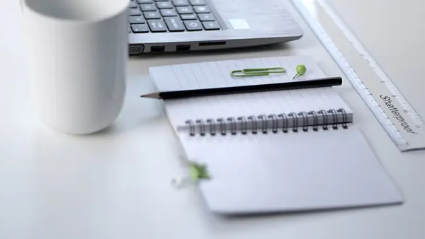 Ruler and laptop on a desk (Unsplash)