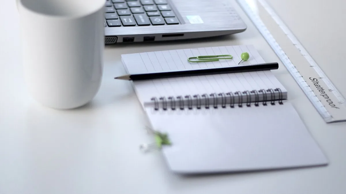 Ruler and laptop on a desk (Unsplash)
