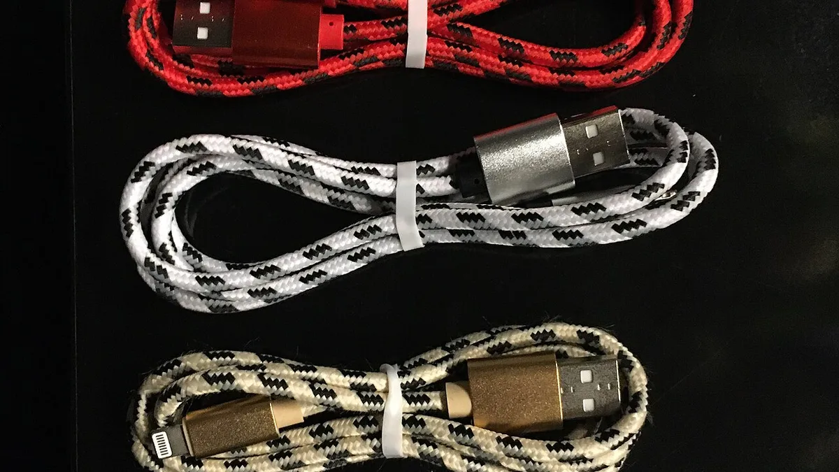 Five USB cables with braided jackets, patterned and in different colours