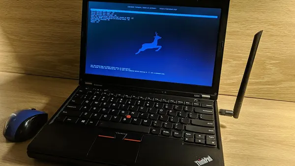 Libreboot running on a Thinkpad X230 with a custome wifi-modification and atop a Thinkpad Ultrabase Series 3 docking station.