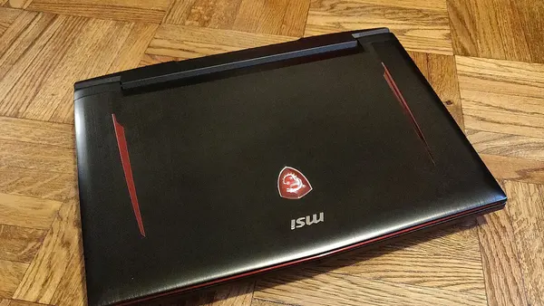 MSI Gaming Laptop on wood floor