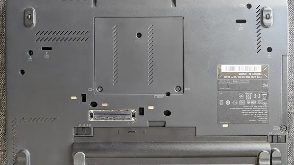 Bottom view of a closed Lenovo ThinkPad X220 laptop