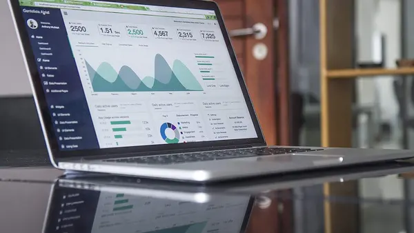 Statistics on a laptop (Unsplash)