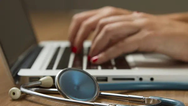 Stethoscope and Laptop Computer - Nci-vol-9713-300