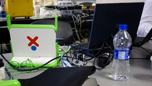 One laptop per child computer shares an Afghan computer lab