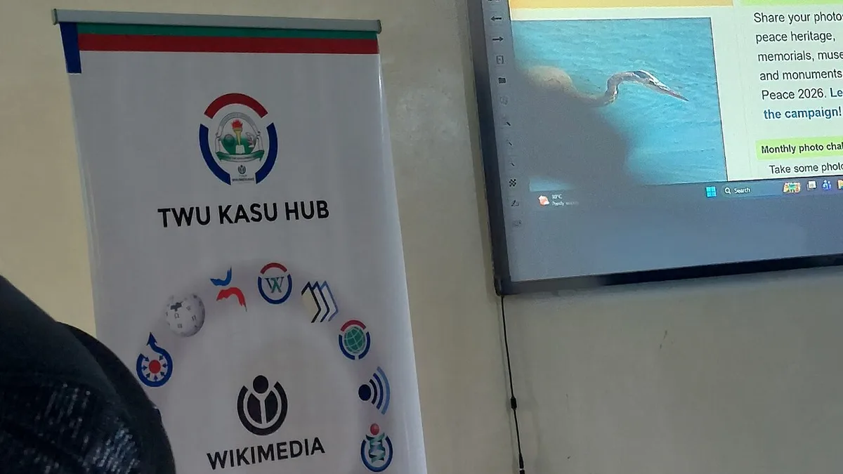 Presentation Screen and Event Banner at an Indoor Event