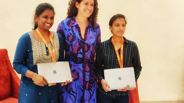 Tulspal and Divya of Wikipedia after receiving Apple laptop from Wikimedia foundation Iduring WWC 2023IMG 20231021 200242-01