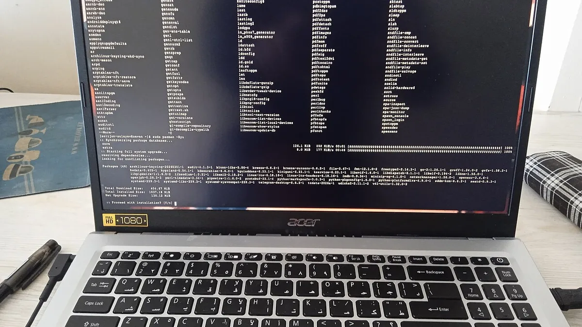 Arch Linux system update via pacman on an Acer laptop
