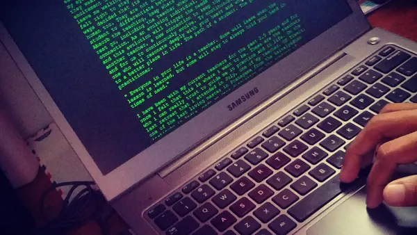 Writing on laptop