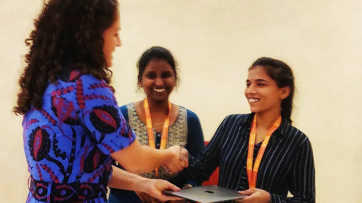 Tulspal of Punjabi Wikipedia receiving Apple laptop from Wikimedia foundation Iduring WWC2023MGIMG 20231021 200142-01