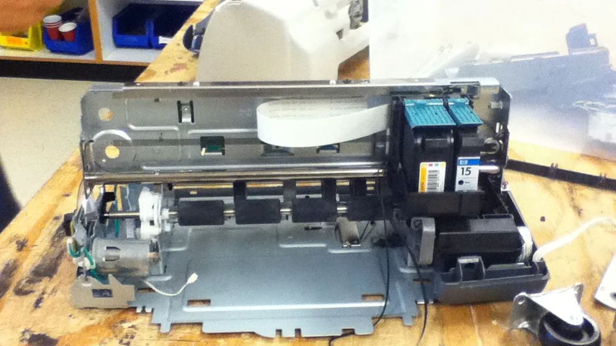 Paper rollers of inkjet printer stripped