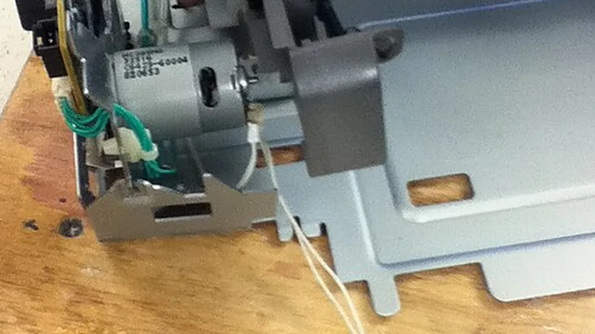 Wires attached to paper feed motor in inkjet