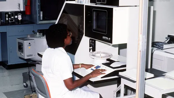 A technician enters data into a computer at Gorgas Army Hospital - DPLA - 2300987e22c18aeeb904c6c80c26a36e