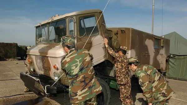 GAZ-66 gets repaired