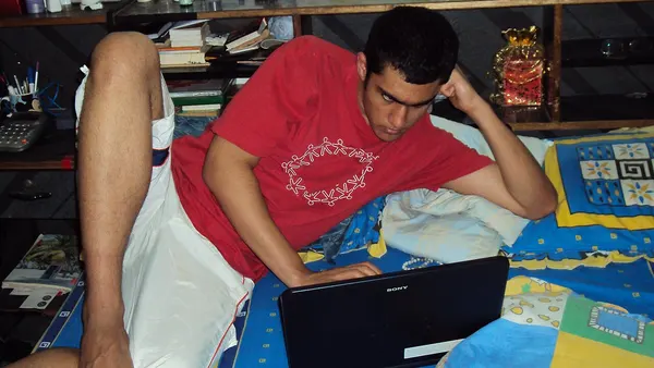 Laptop use in bed in 2000s