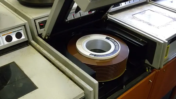 Disk drive of professional large computer system (1970s) with removable disk pack as storage medium inside, from 'International Computers Limited'